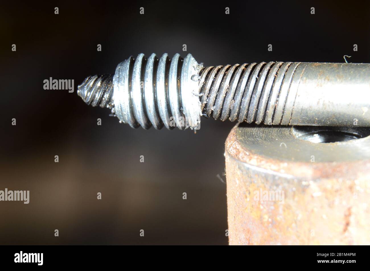 Tap extractor with the stump of a broken bolt Stock Photo