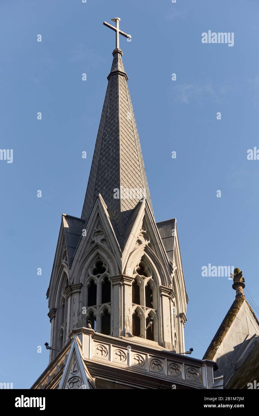 Closeup of the  French Gothic revival style steeple of the 19th century Holy Rosary Cathedral in downtown Vancouver, BC, Canada Stock Photo