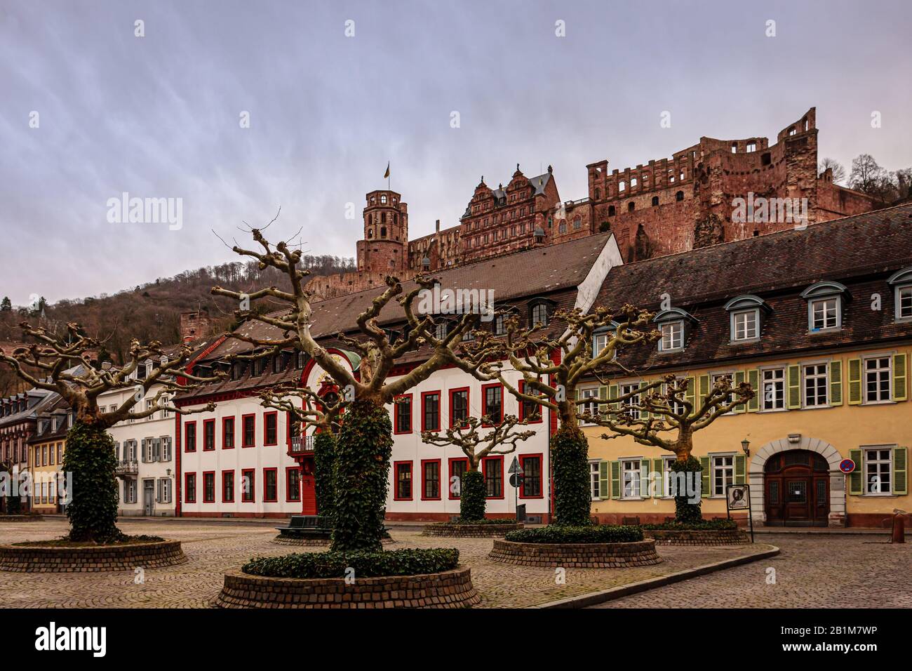 Heidelberg castle and 'Karlsplatz' square against sky at dusk Stock Photo