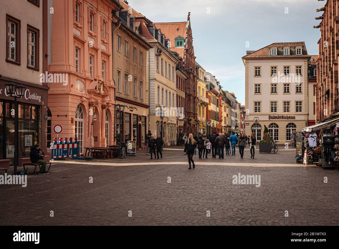 Heidelberg, Germany, February 22, 2020: Pedestrians on market square in old town Stock Photo