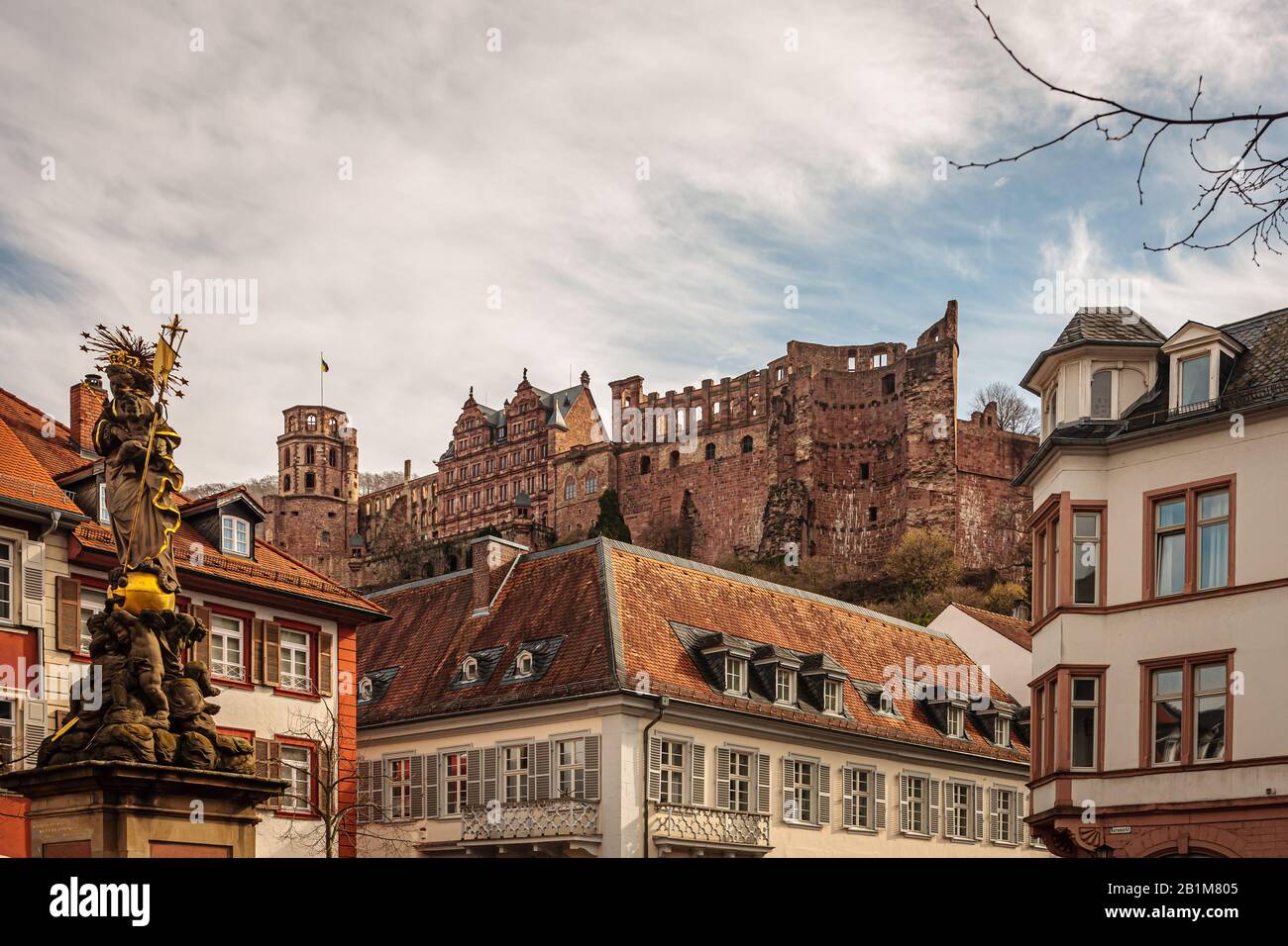 Heidelberg castle and 'Kornmarkt' square against sky Stock Photo