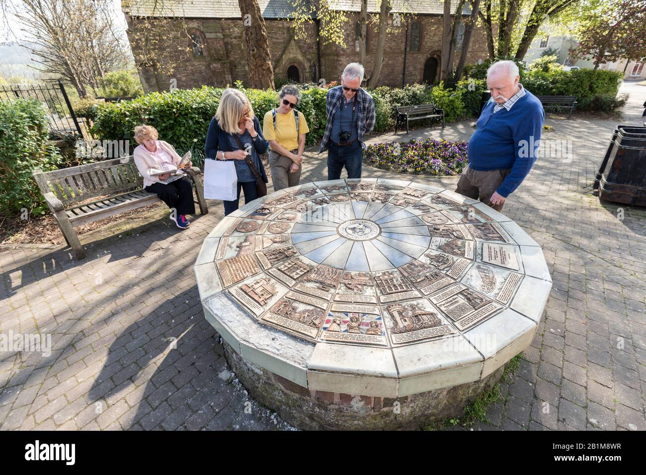 Millennium ceramic mosaic wheel by Ned Heywood at the Monnow Bridge commemorating Monmouth's history, Wales, UK Stock Photo
