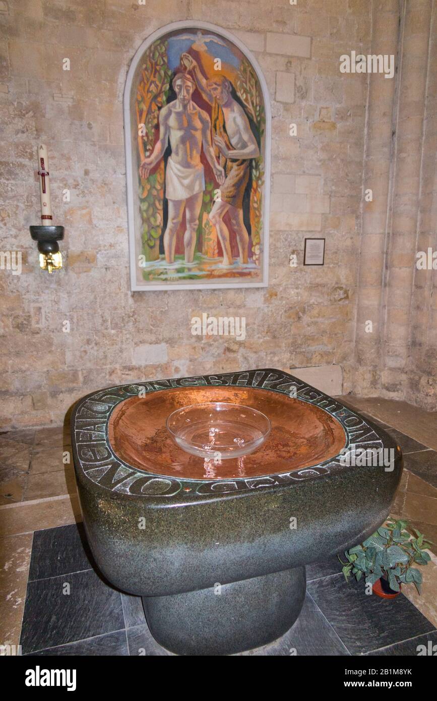 'The Baptism of Christ' by Hans Feibusch (1951) above the Baptismal Font by John Skelton which dates from !983, in Chichester Cathedral's Baptistry. UK. (114) Stock Photo