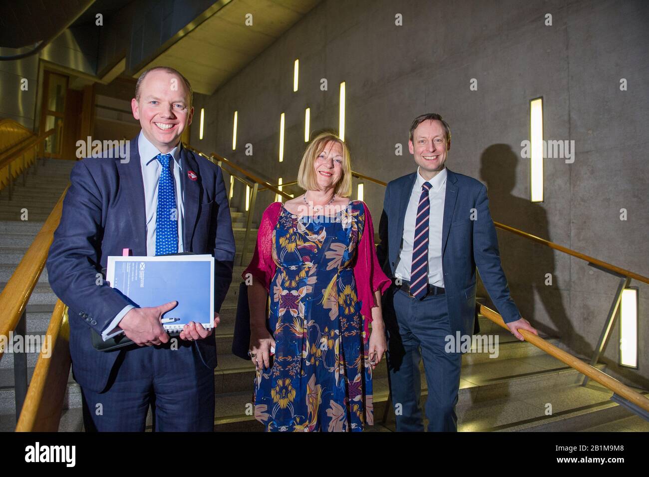 Edinburgh, UK. 26th Feb, 2020. Pictured: (L-R) Donald Cameron MSP - Shadow Cabinet Secretary for Finance; Linda Fabiani MSP - Deputy Presiding Officer and Member for East Kilbride for the Scottish National Party (SNP); Liam Kerr MSP - Deputy Leader, Shadow Cabinet Secretary for Justice. Scenes from thee Scottish Parliament after decision time in the Chamber. Credit: Colin Fisher/Alamy Live News Stock Photo