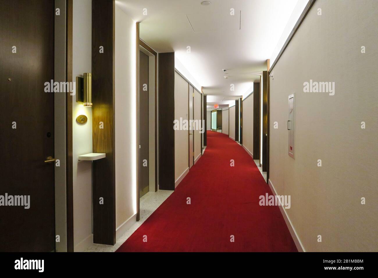 Red carpeted hallway in the TWA Hotel, JFK, USA Stock Photo