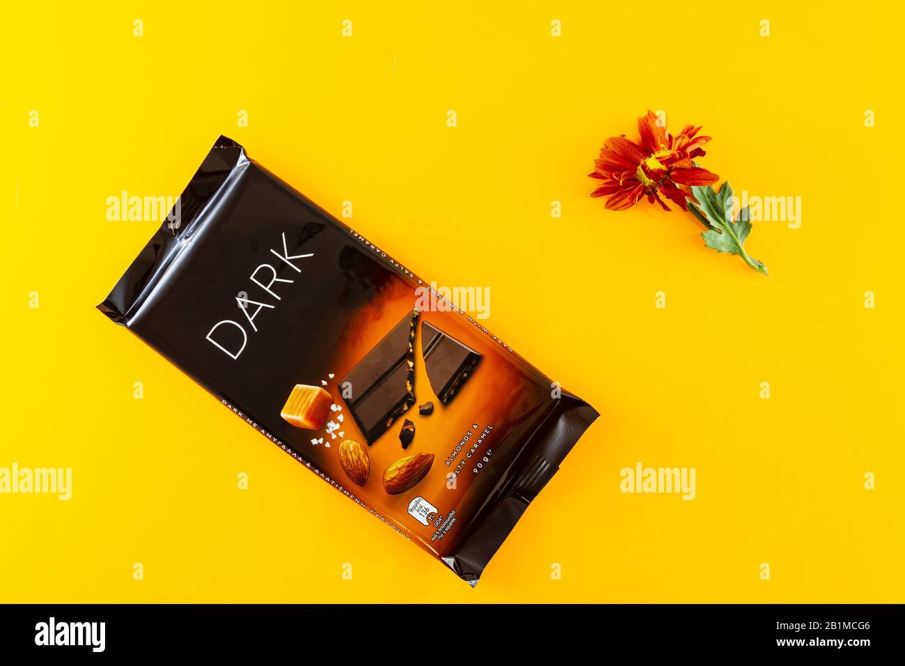 Dark Almond and Salty Caramel Chocolate bar wrapped in aluminium foil