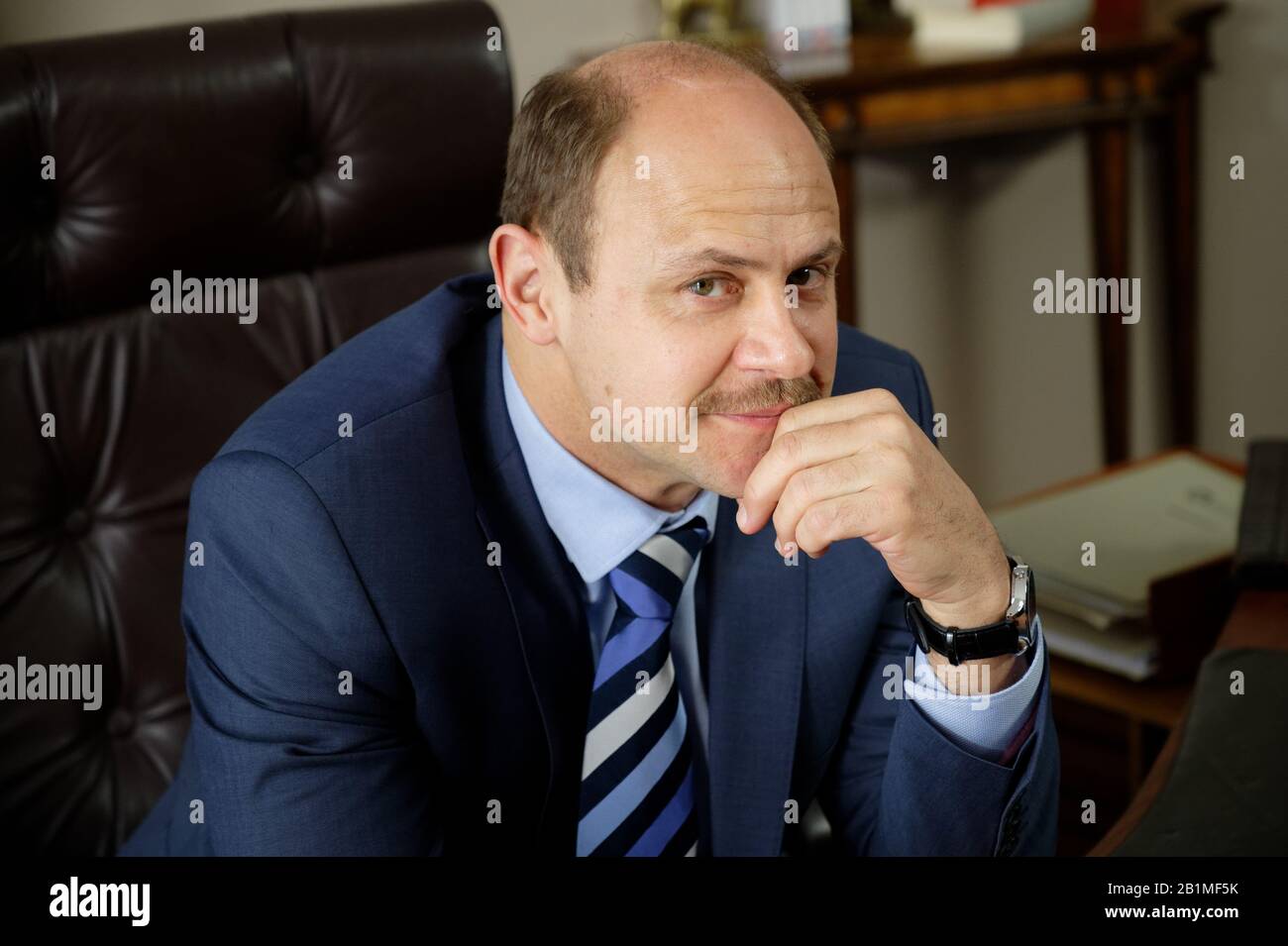Cologne, Germany. 26th Feb, 2020. The actor Moritz Führmann sits on the film set during shooting for the second season of the ARD lawyers' series 'Falk'. Credit: Henning Kaiser/dpa/Alamy Live News Stock Photo