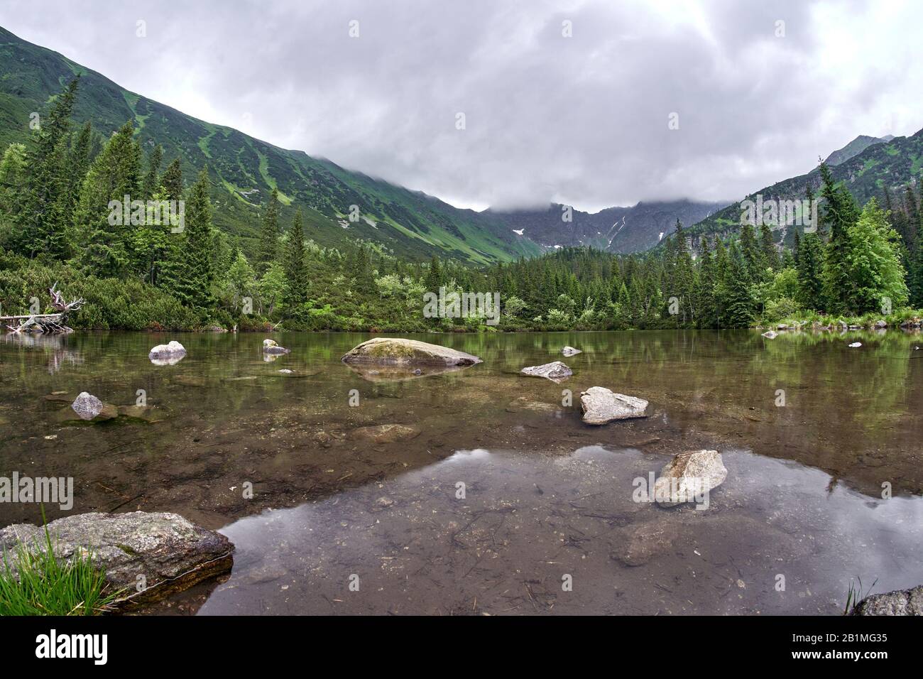 Tatliak's lake, West High Tatras Mountains, Slovakia in Summer with cloudy sky Stock Photo