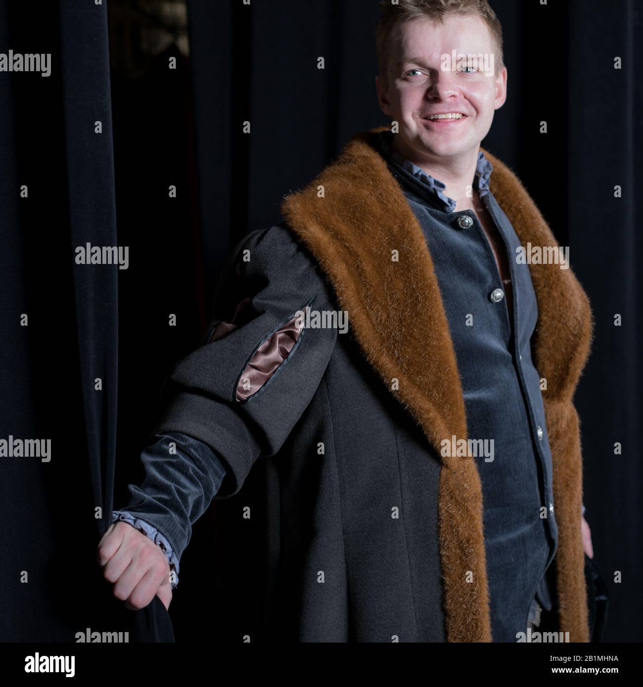 Actor dressed historical costume in interior of old theater Stock Photo ...