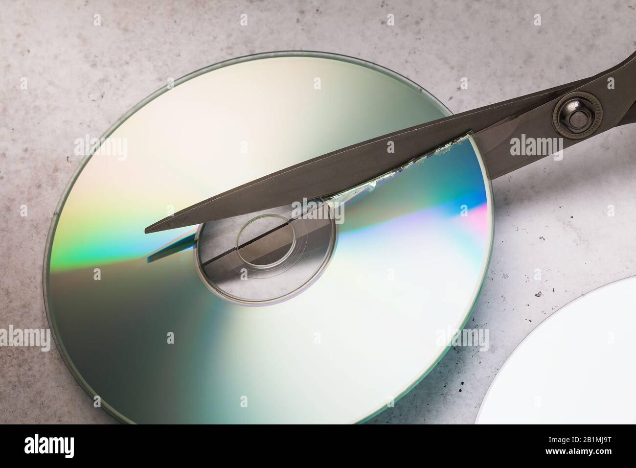 Scissors cut cd. Information destruction concept Stock Photo