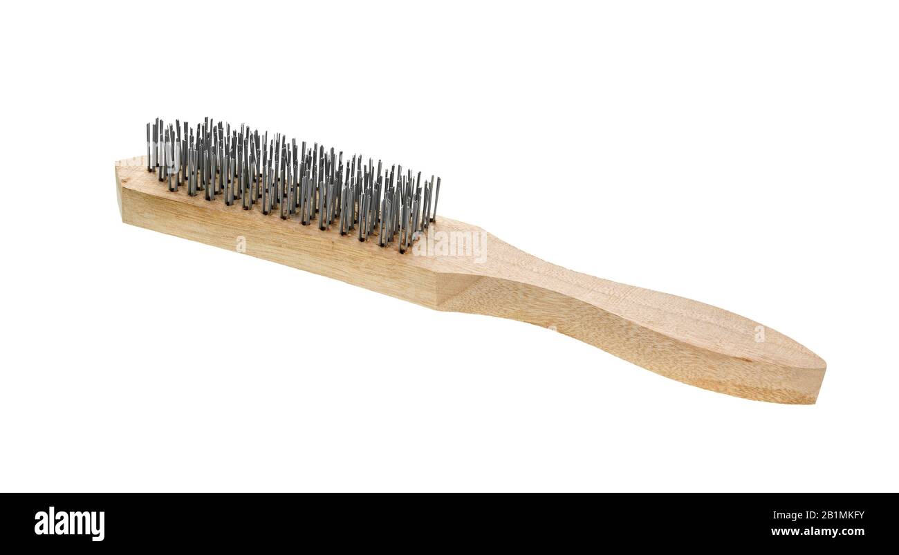 Wire brush with wooden handle on white background. Metal Brush. Steel wire brush rough tool cut out white. Stock Photo
