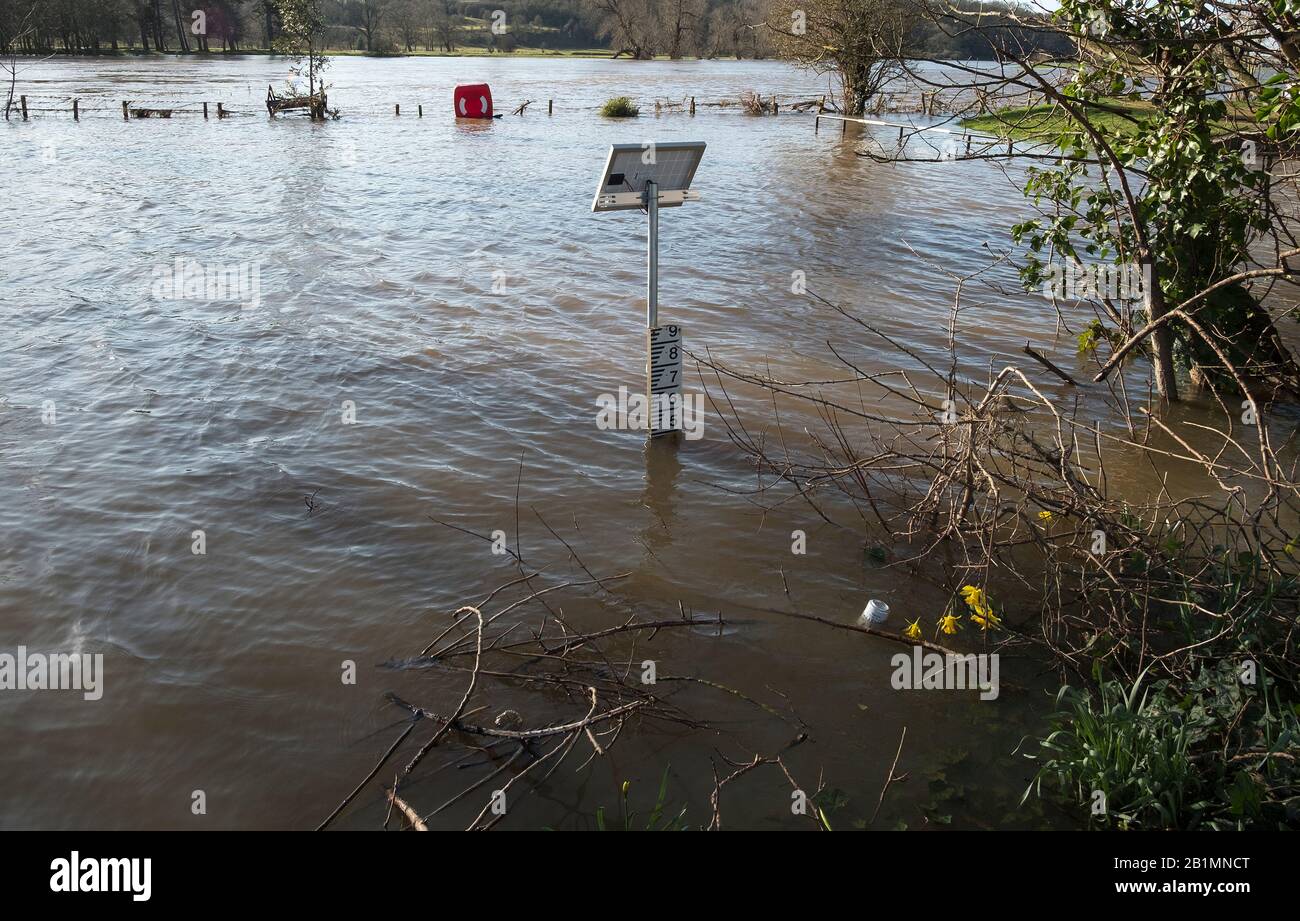 Water depth gauge indicator in a flooded river Stock Photo