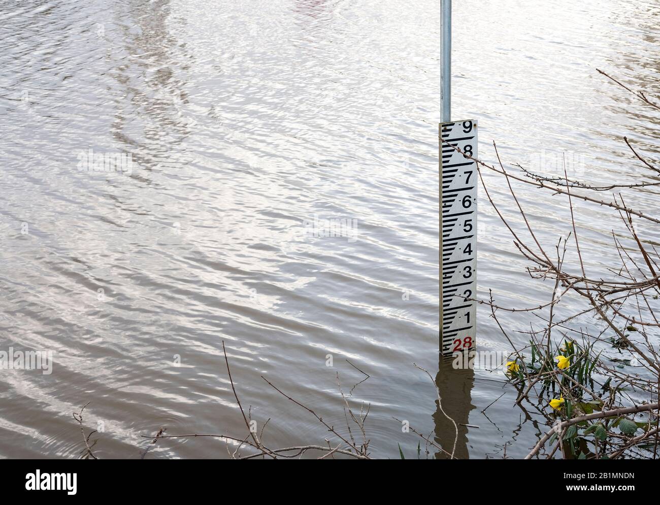Water depth gauge indicator in a flooded river Stock Photo - Alamy