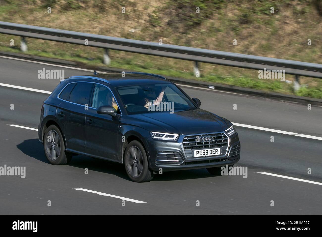 2019 Audi Q5 S Line Tdi Quattro S-A Grey car SUV Diesel driving on the M6 motorway near Preston in Lancashire, UK Stock Photo