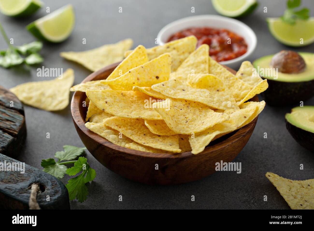 Tortilla chips in a bowl with salsa Stock Photo Alamy