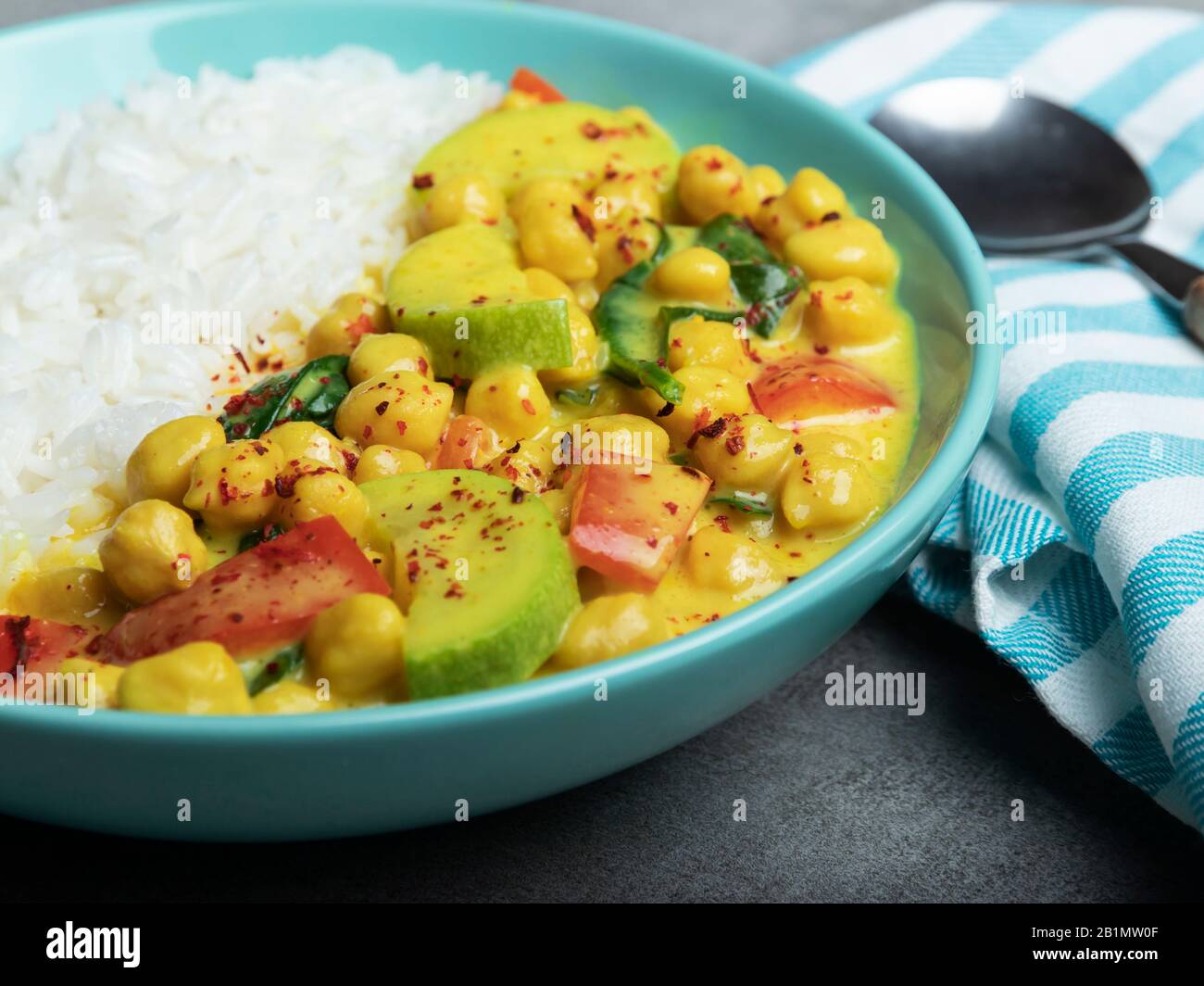 rice, chickpeas, zucchini, with coconut milk and curry sauce