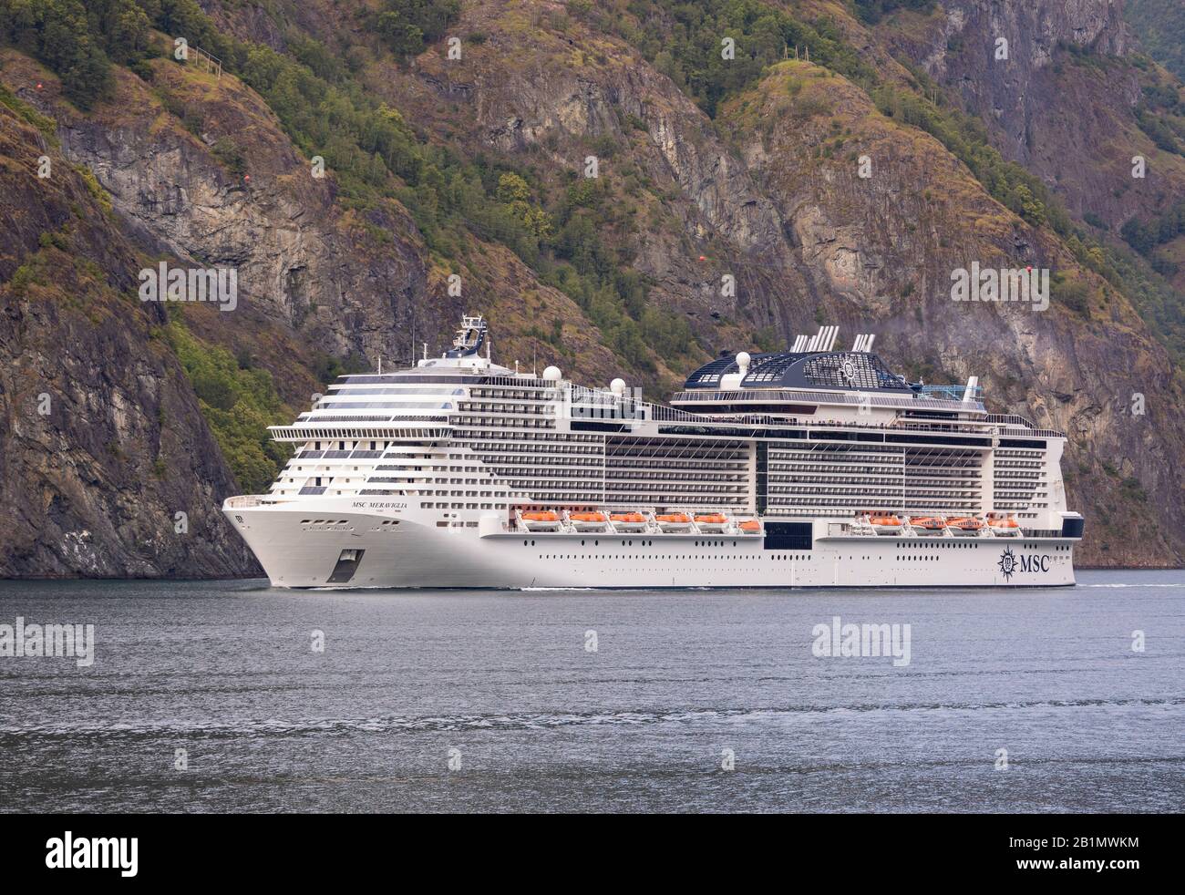 UNDREDAL, NORWAY - Cruise ship MSC Meraviglia on Aurlandsfjorden fjord. Stock Photo