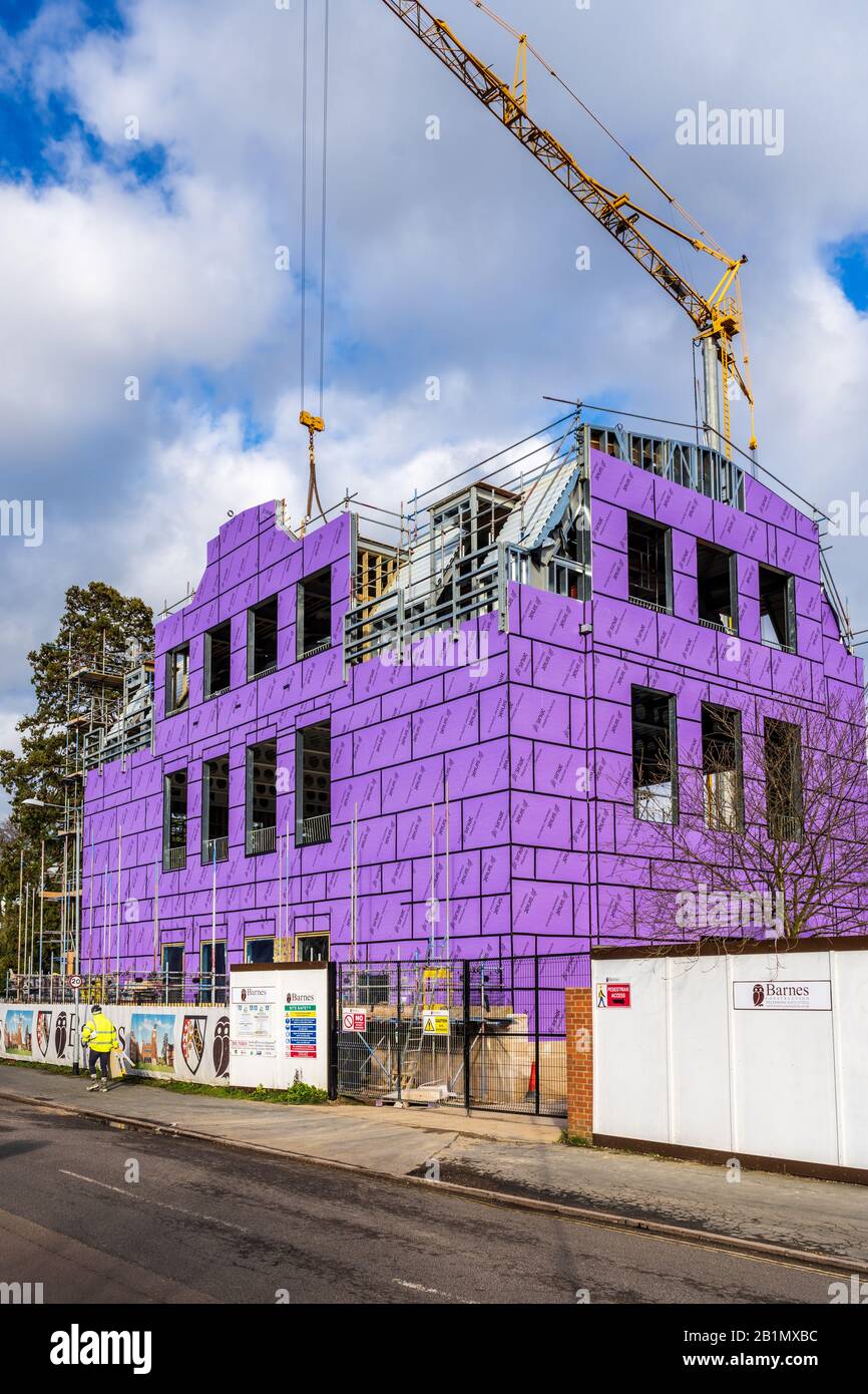 Siniat Weather Defence external sheathing board being installed on a new build Cambridge University building. Stock Photo