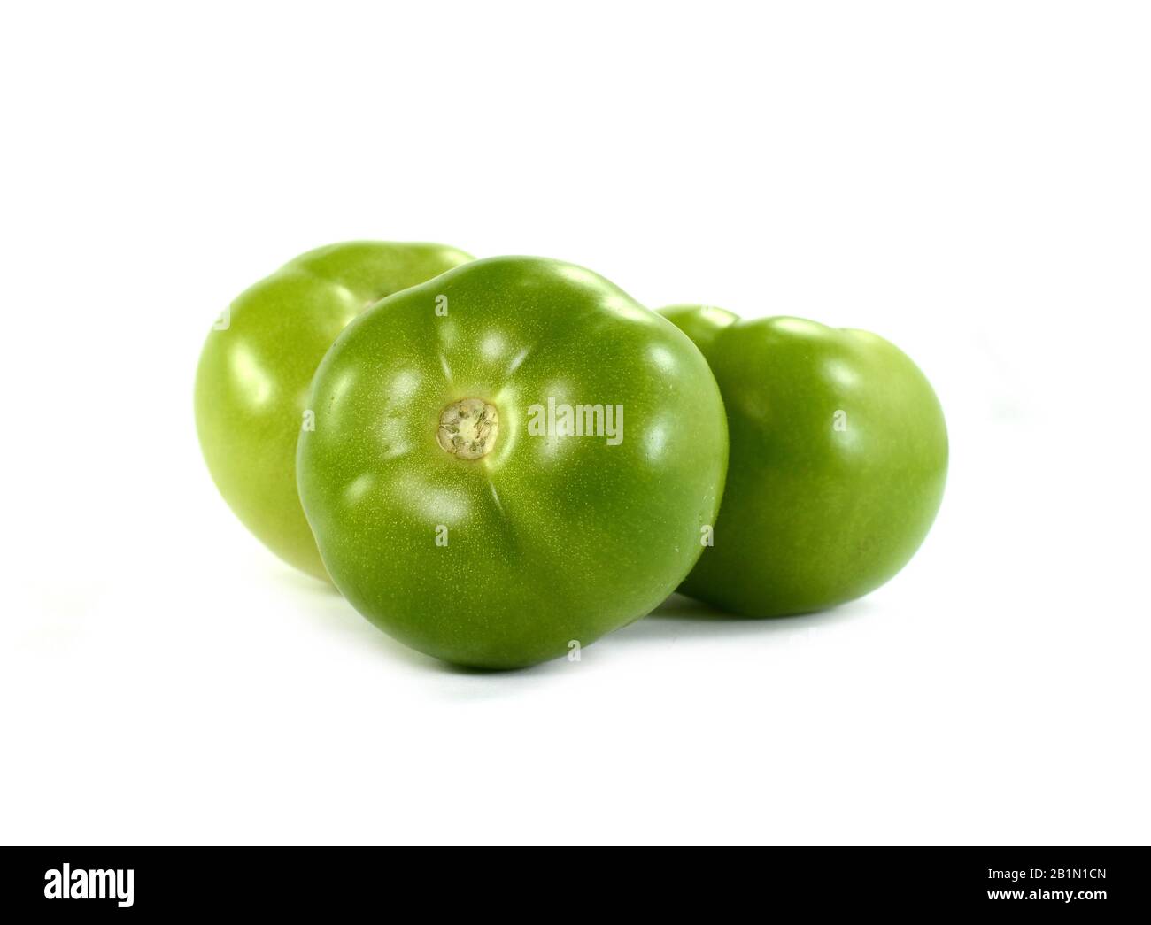 green tomato on white background Stock Photo - Alamy