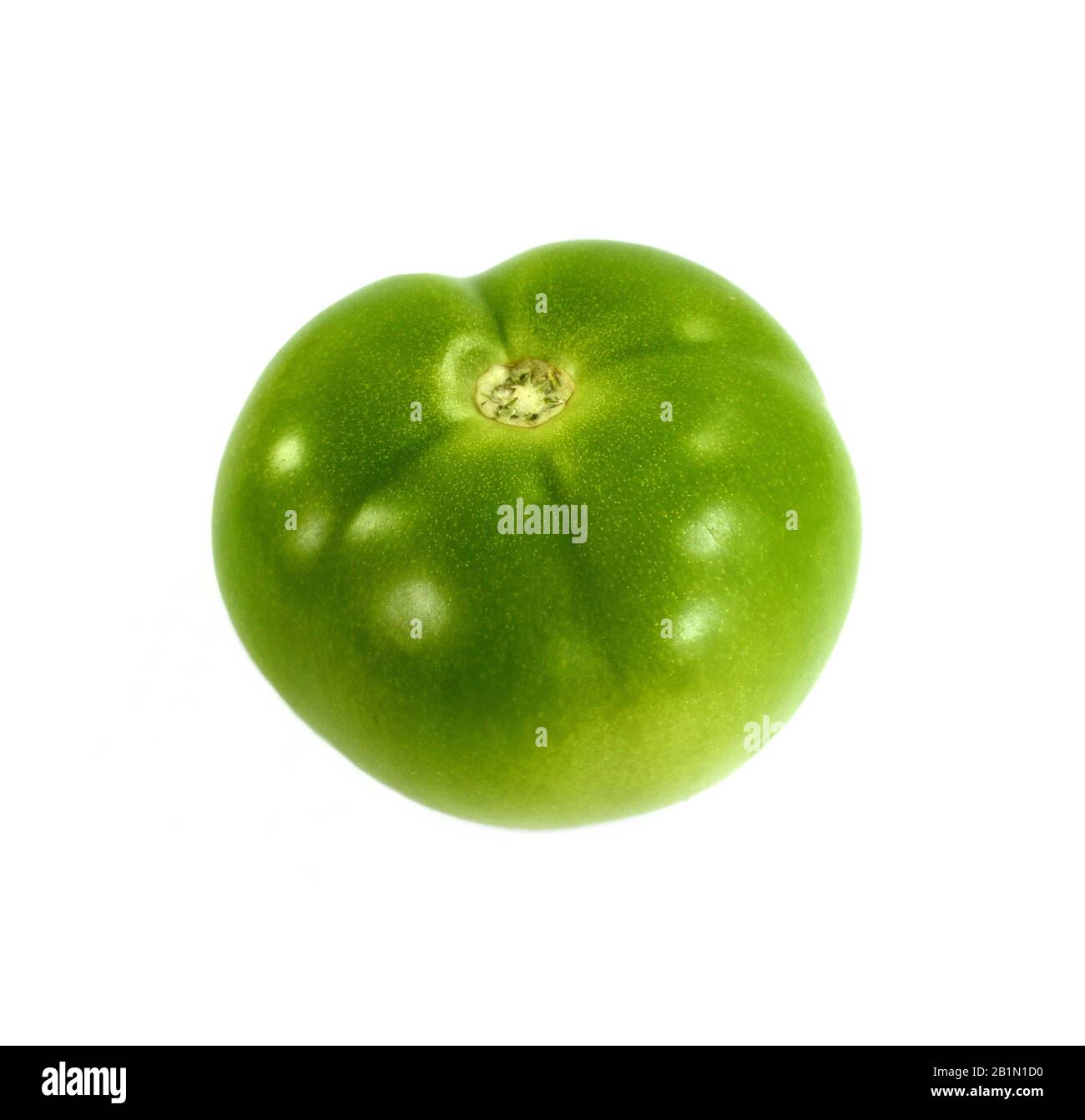 green tomato on white background Stock Photo - Alamy