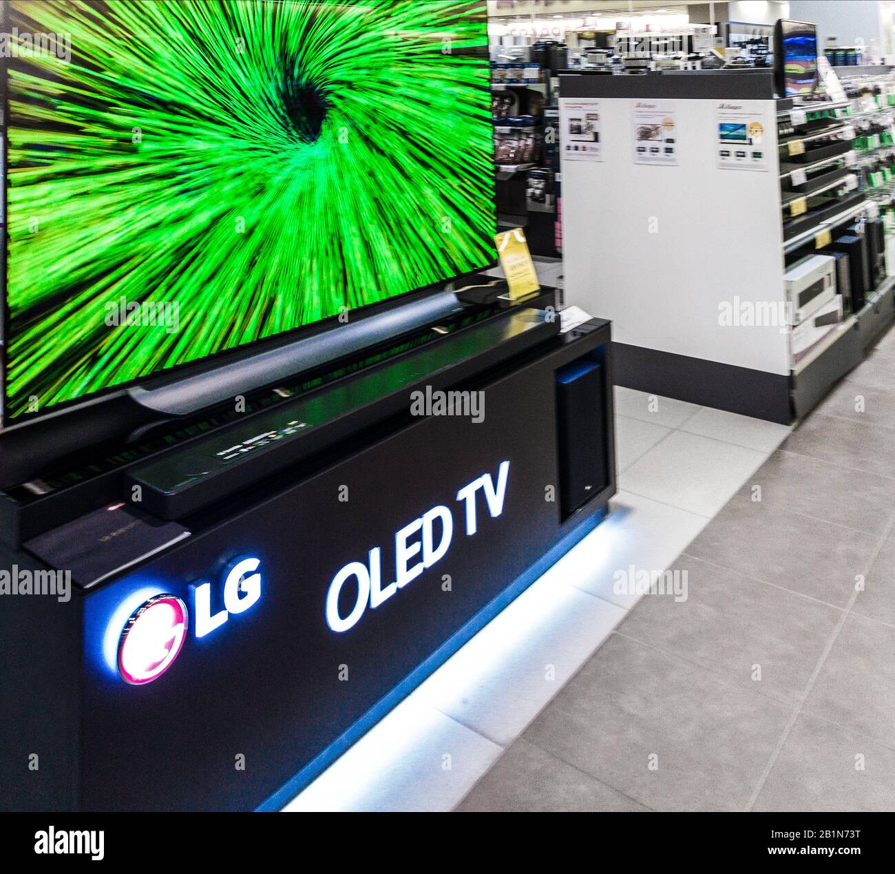 2020: UHD OLED TV LG home theater system, shows the demo pictures in an electronic shop Stock Photo