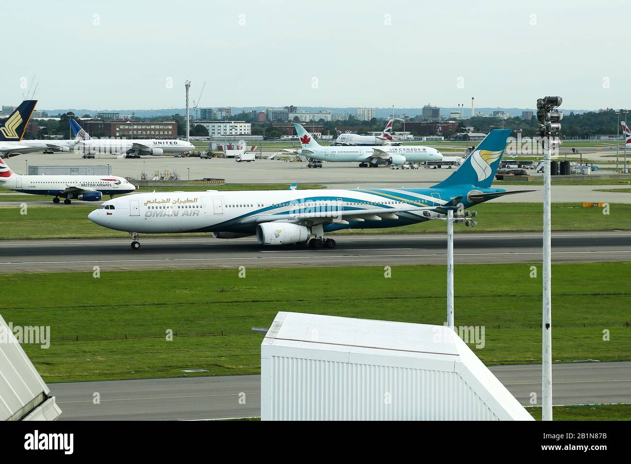 An Oman Air Airbus A330 aircraft on the runaway at London Heathrow