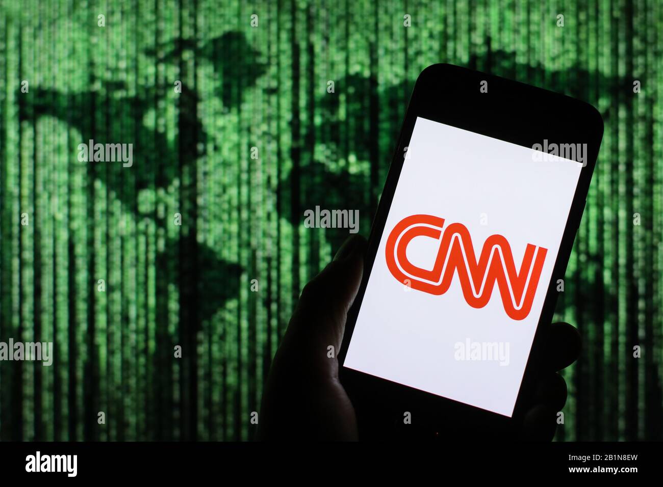 Cnn Media News Company Logo Seen Displayed On Smart Phone Screen With Matrix Like World Map Visible Blurred In The Background Stock Photo Alamy