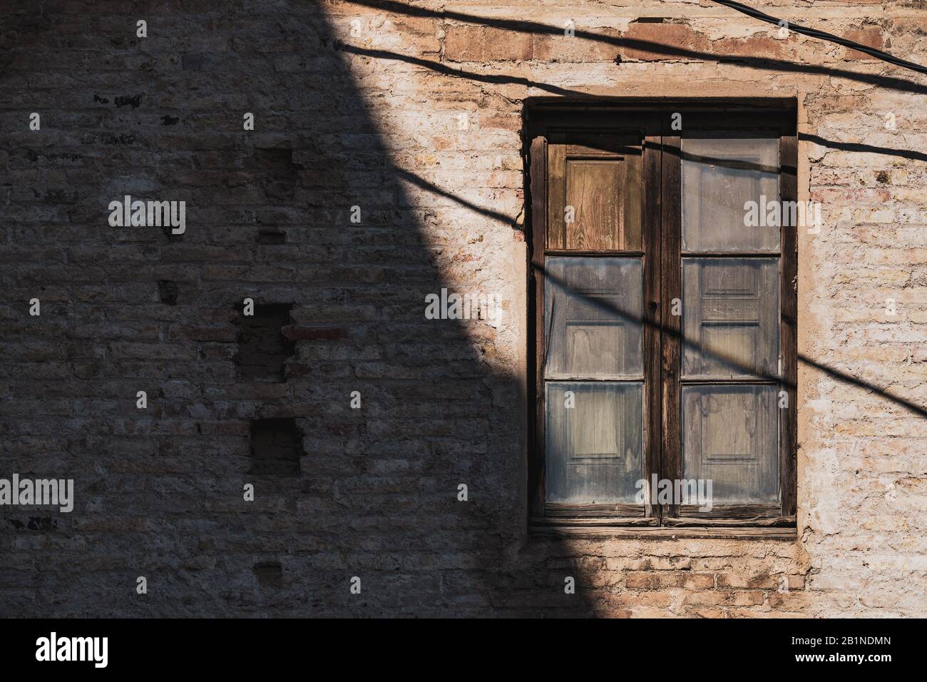Antique wooden window of an old red brick building Stock Photo - Alamy