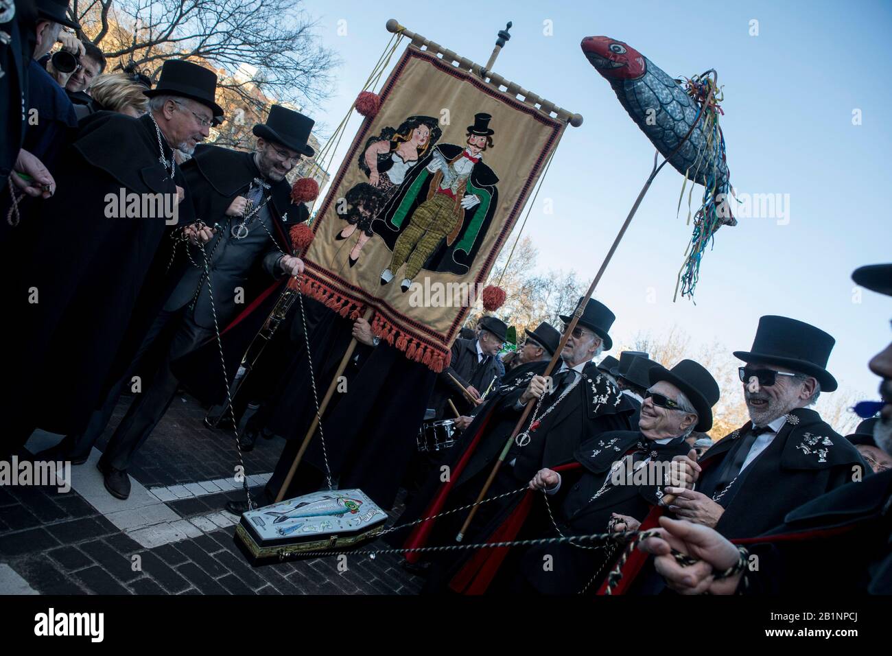 The Brotherhood of the ''Burial of the Sardine'' carry a coffin containing an artificial sardine during the Burial of the Sardine procession. The Sardine procession which takes place in Madrid, is a centuries-old Spanish tradition made famous by a painting of the Spanish artist Francisco de Goya called ‘The Burial of the Sardine'. It mark the end of Carnival celebrations and the beginning of Lent 40 days before Easter. It consists of a procession that parodies a funeral in which a symbolic figure of a sardine in its coffin is burned. The festivity takes place every Ash Wednesday and symboliz Stock Photo