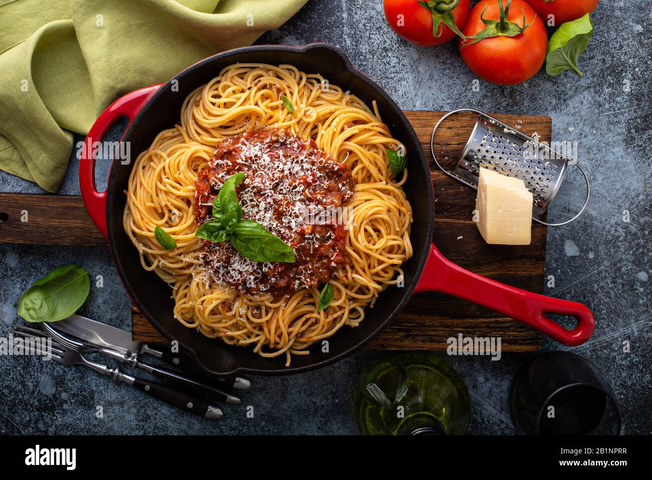 Spaghetti Bolognese in a cast iron pan Stock Photo Alamy