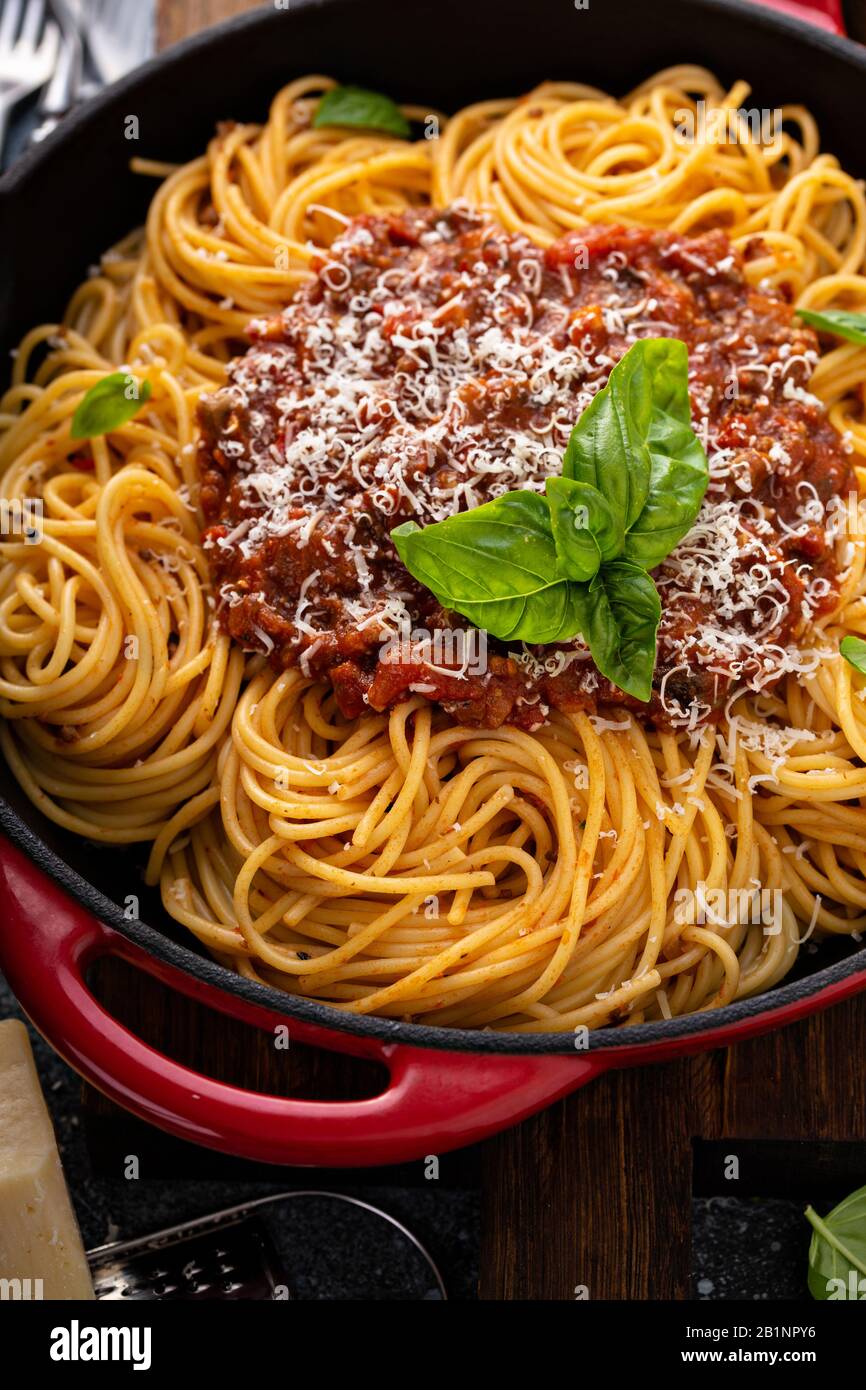 Spaghetti Bolognese in a cast iron pan Stock Photo Alamy