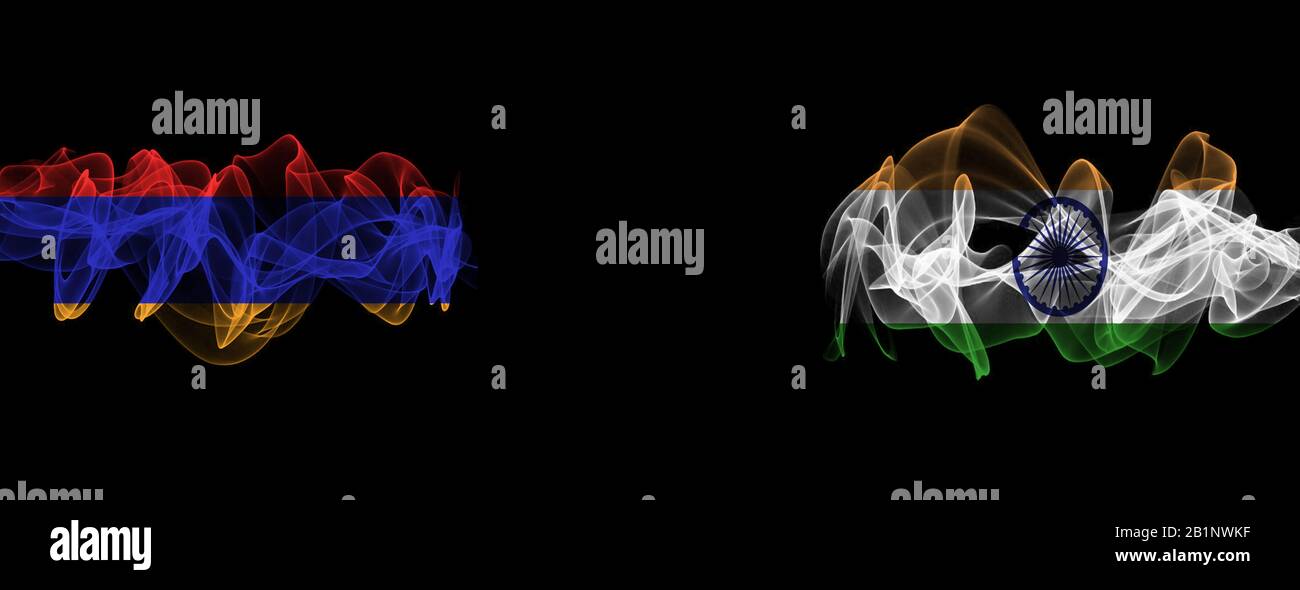 Flags of Armenia and India on Black background, Armenia vs India Smoke Flags Stock Photo