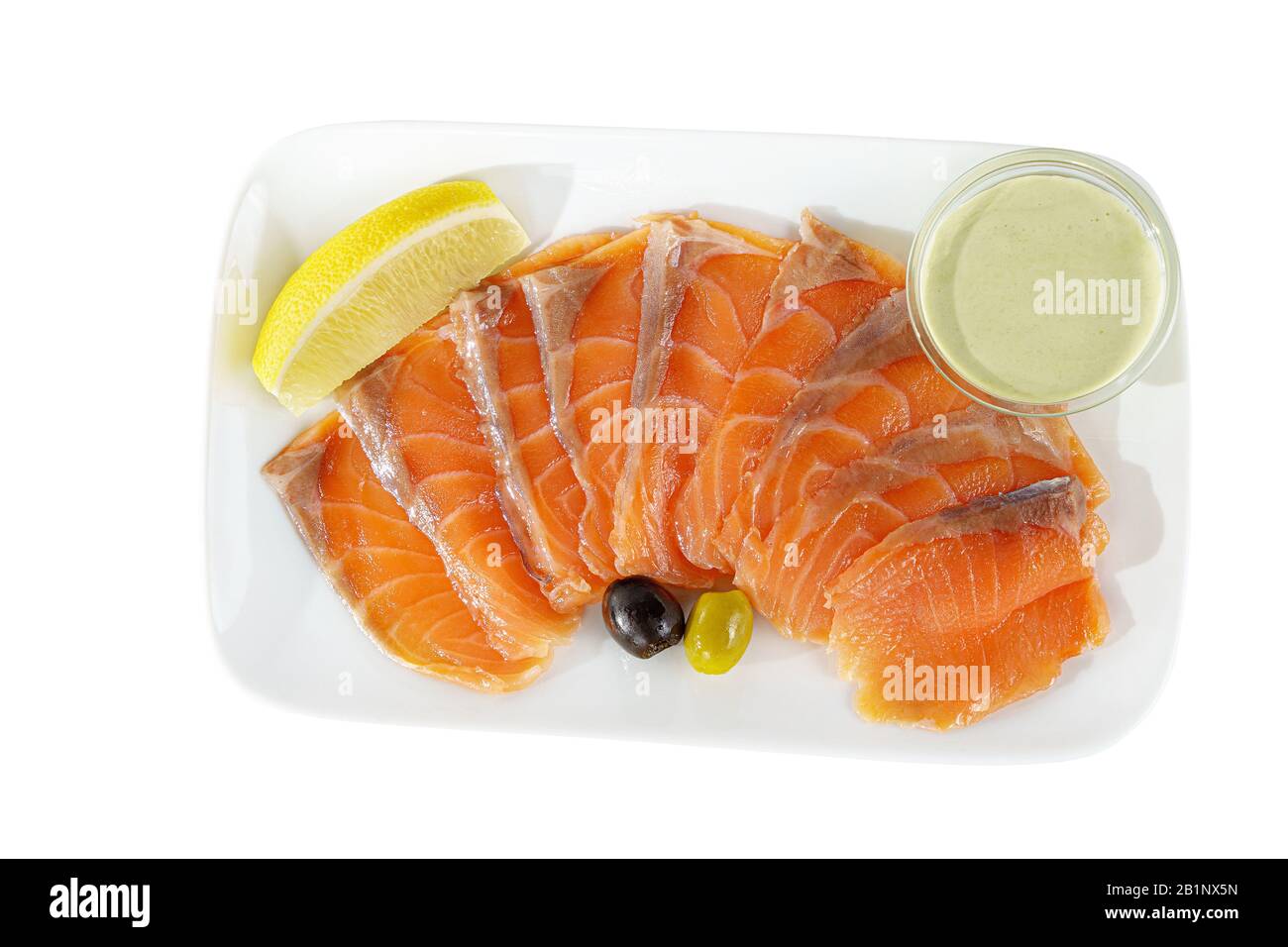 https://c8.alamy.com/comp/2B1NX5N/cold-appetizer-before-alcohol-salmon-fillet-salted-with-sauce-wasabi-9-pieces-mayonnaise-sour-cream-lemon-slice-and-olives-on-square-plate-white-2B1NX5N.jpg