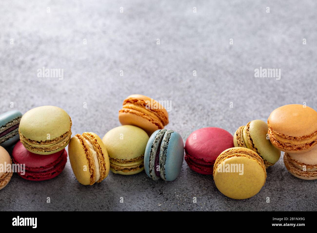 Variety of colorful macarons on the table Stock Photo