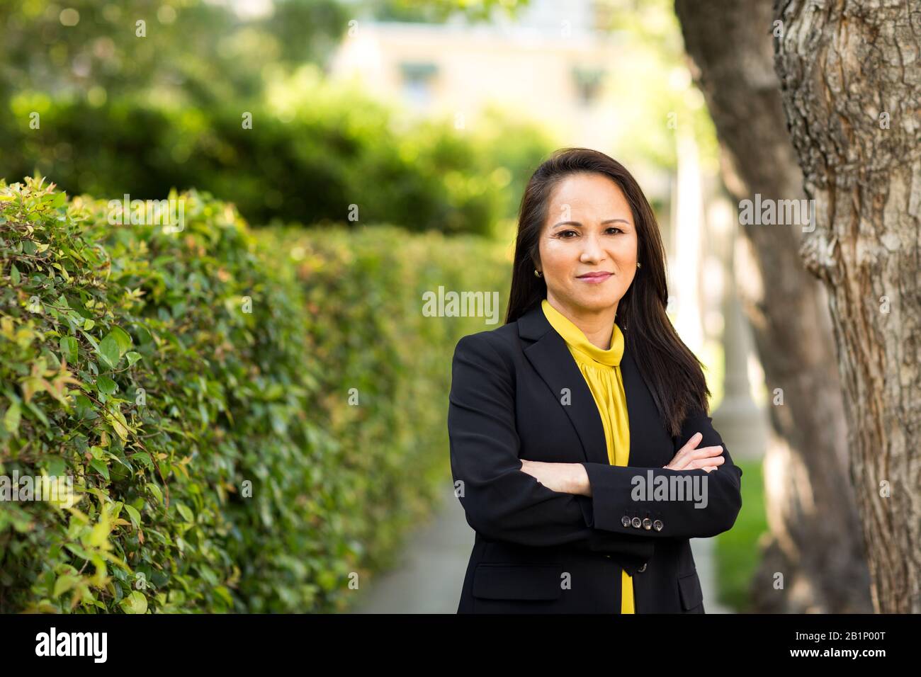 Portrait of a mature Asian woman in a business suit. Stock Photo