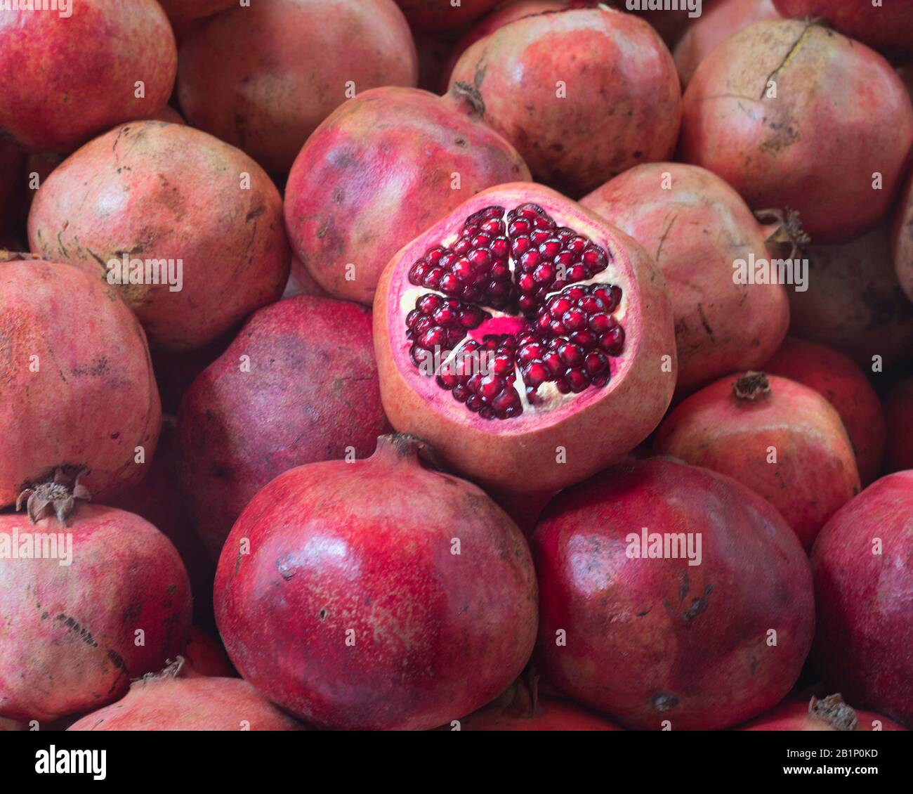Pomegranates for sale in Carmel Market (Shuk HaCarmel), the largest market in Tel Aviv, Israel Stock Photo