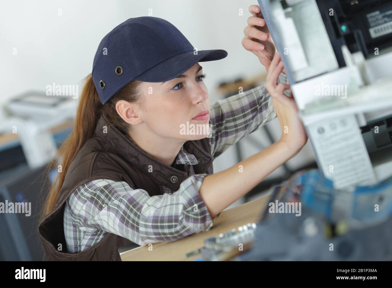 woman working with 3d printer Stock Photo