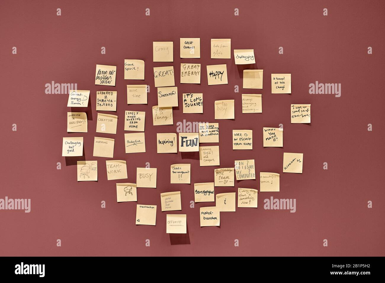 Wine Sticky Notes Wine-red wall with hanging yellow sticky notes Stock Photo - Alamy