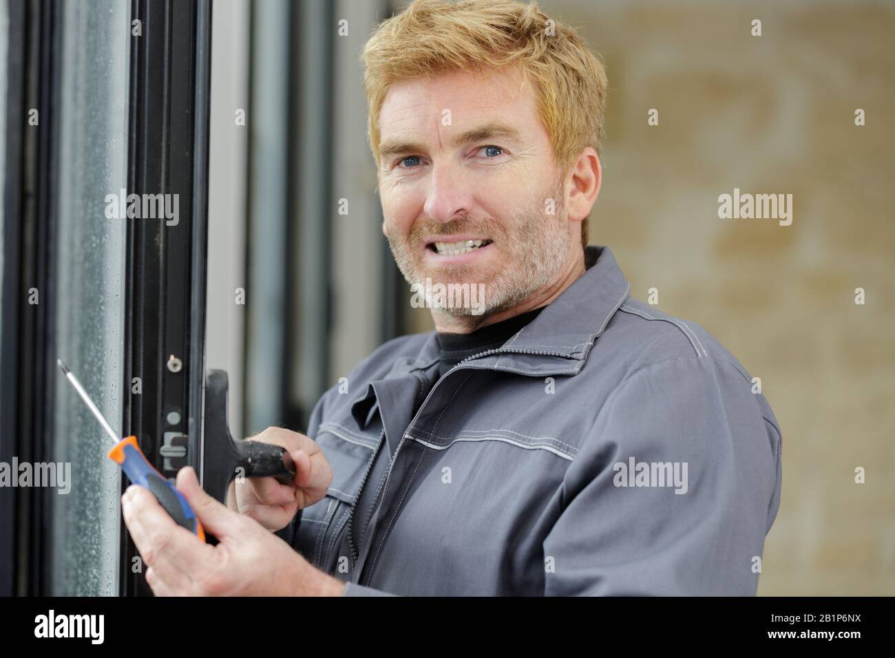 installation and repair of plastic windows Stock Photo Alamy
