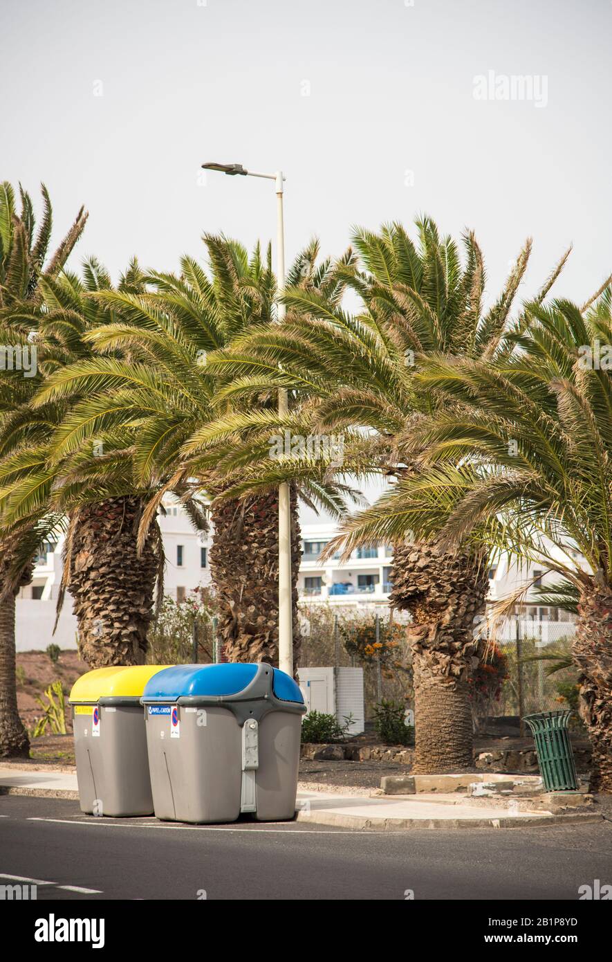 Large colourful waste disposal wheelie bins for commercial use on the