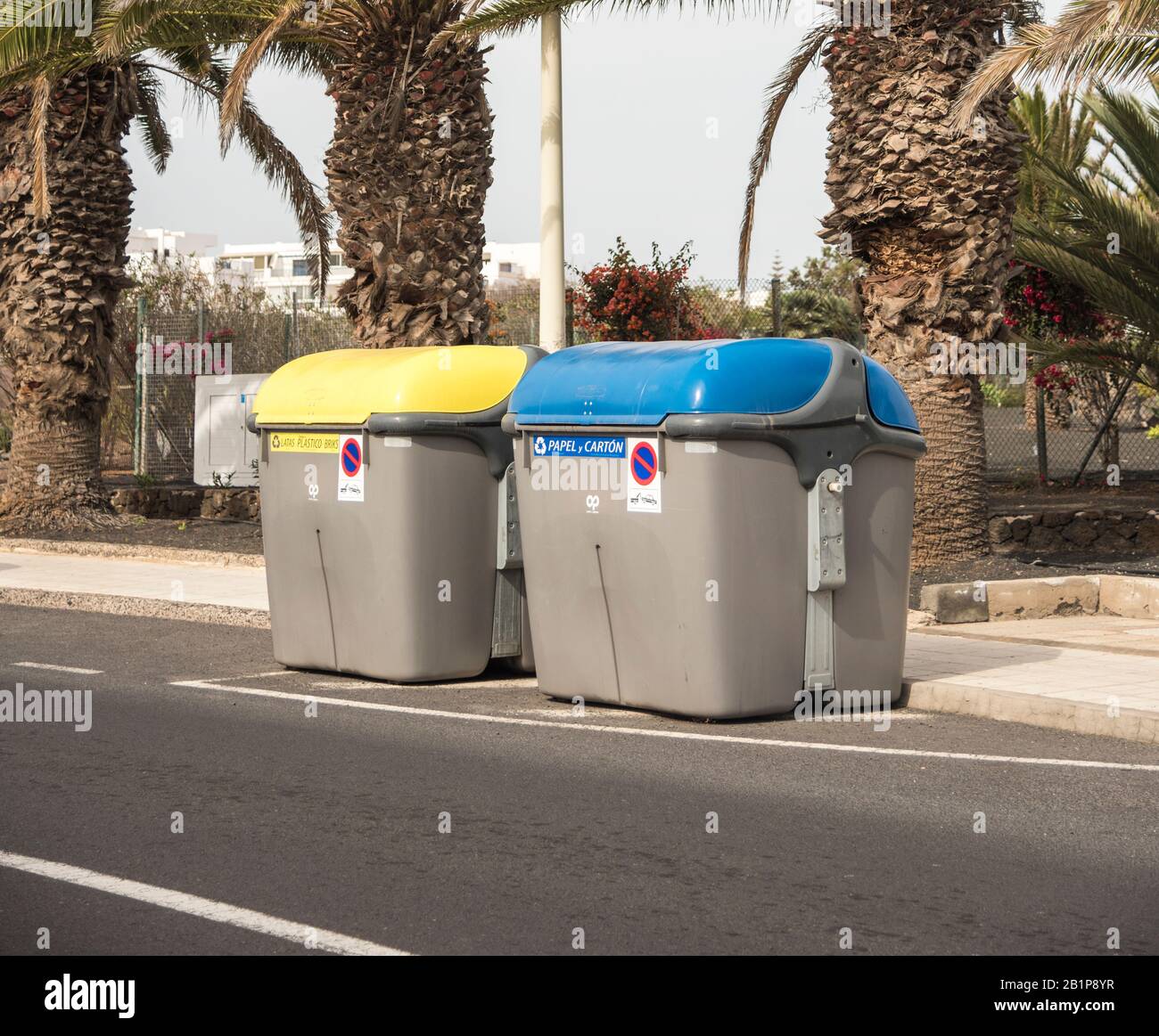 Large colourful waste disposal wheelie bins for commercial use on 