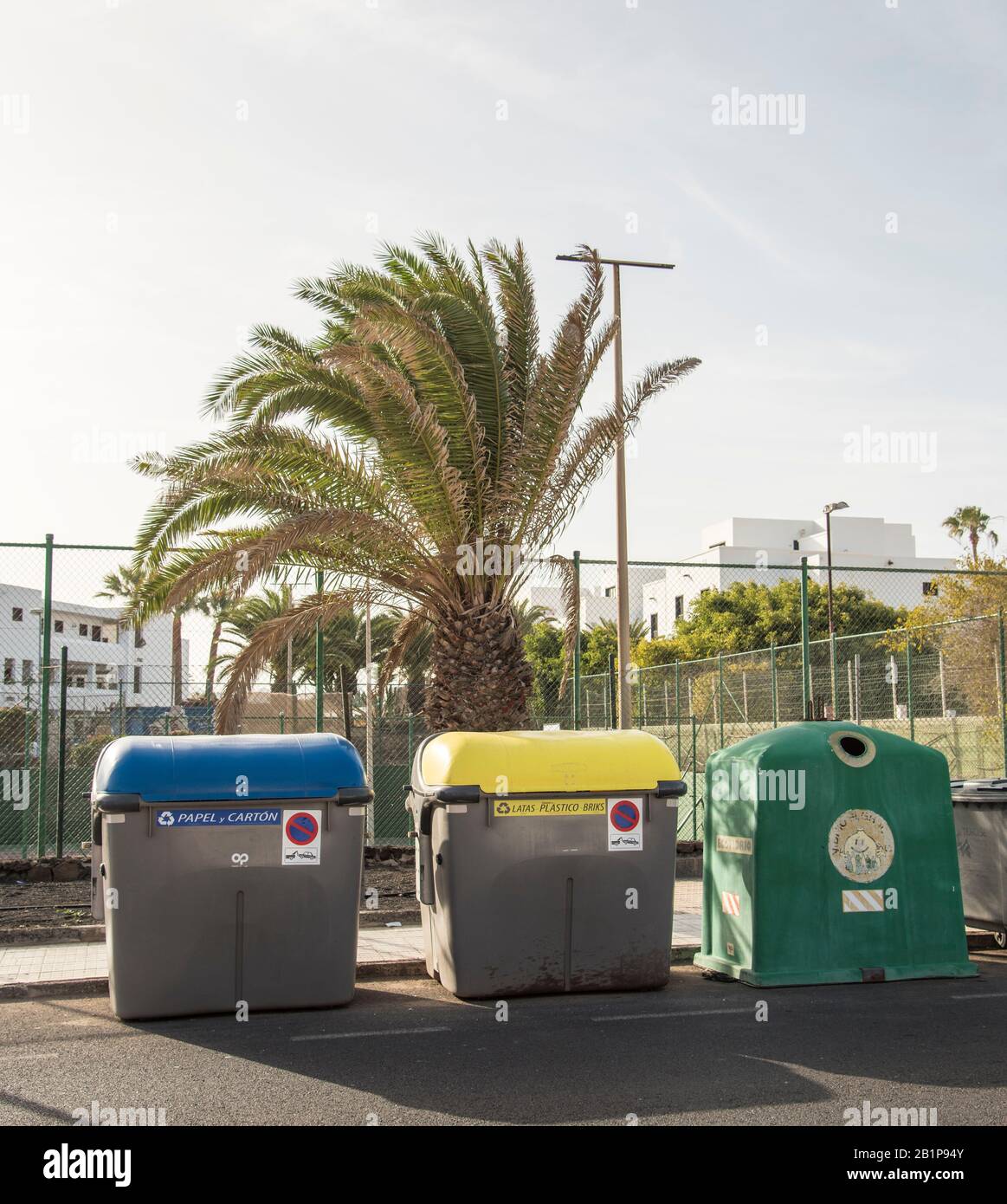 Large colourful waste disposal wheelie bins for commercial use on the