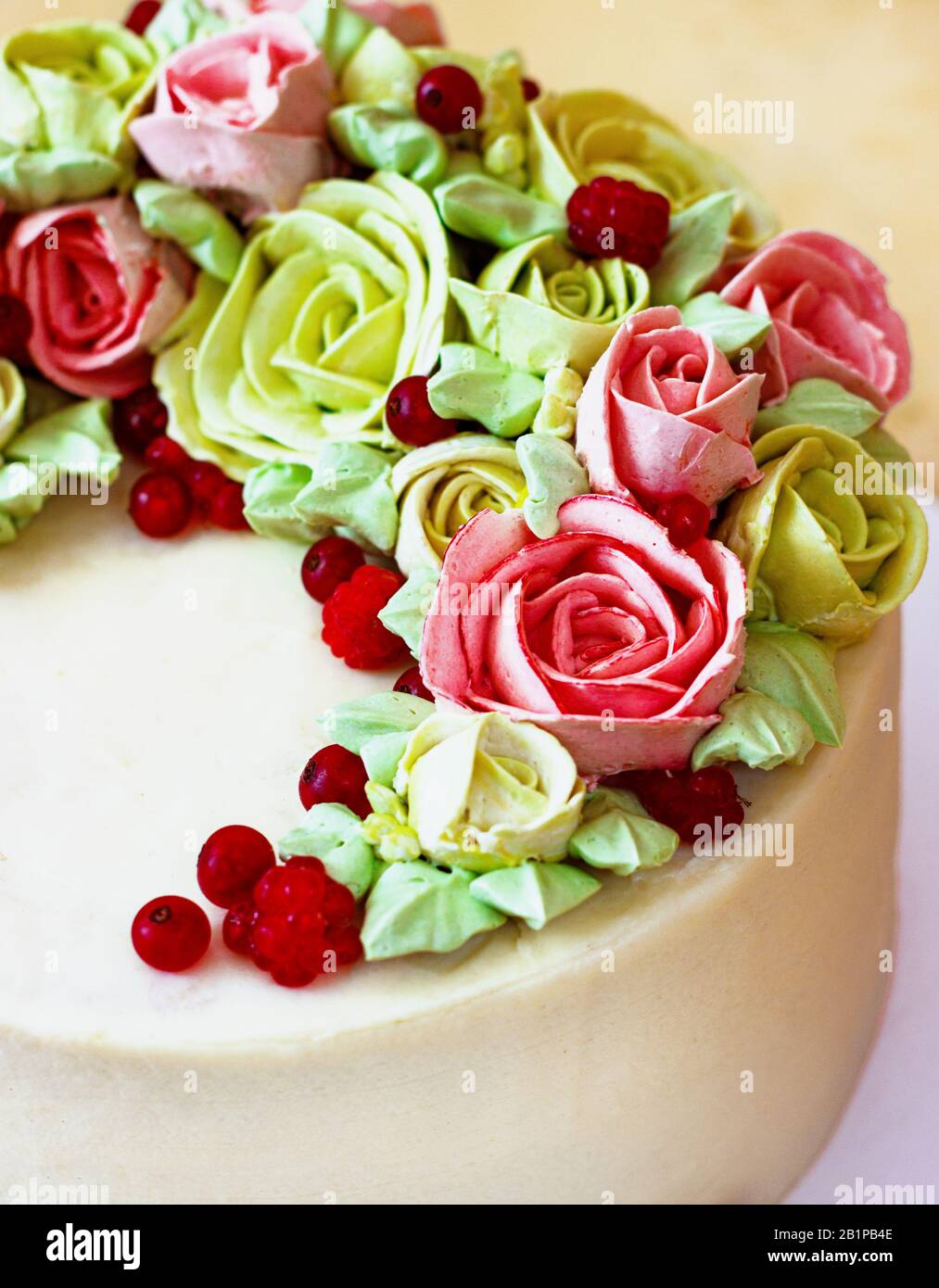 Birthday cake with flowers rose on light background Stock Photo - Alamy