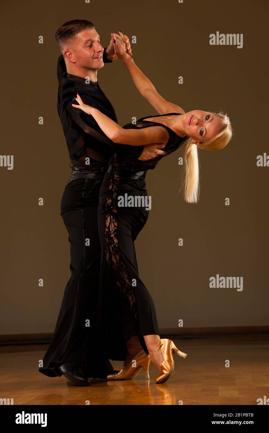 Beautiful ballroom  couple preforms their exhibition dance Stock Photo