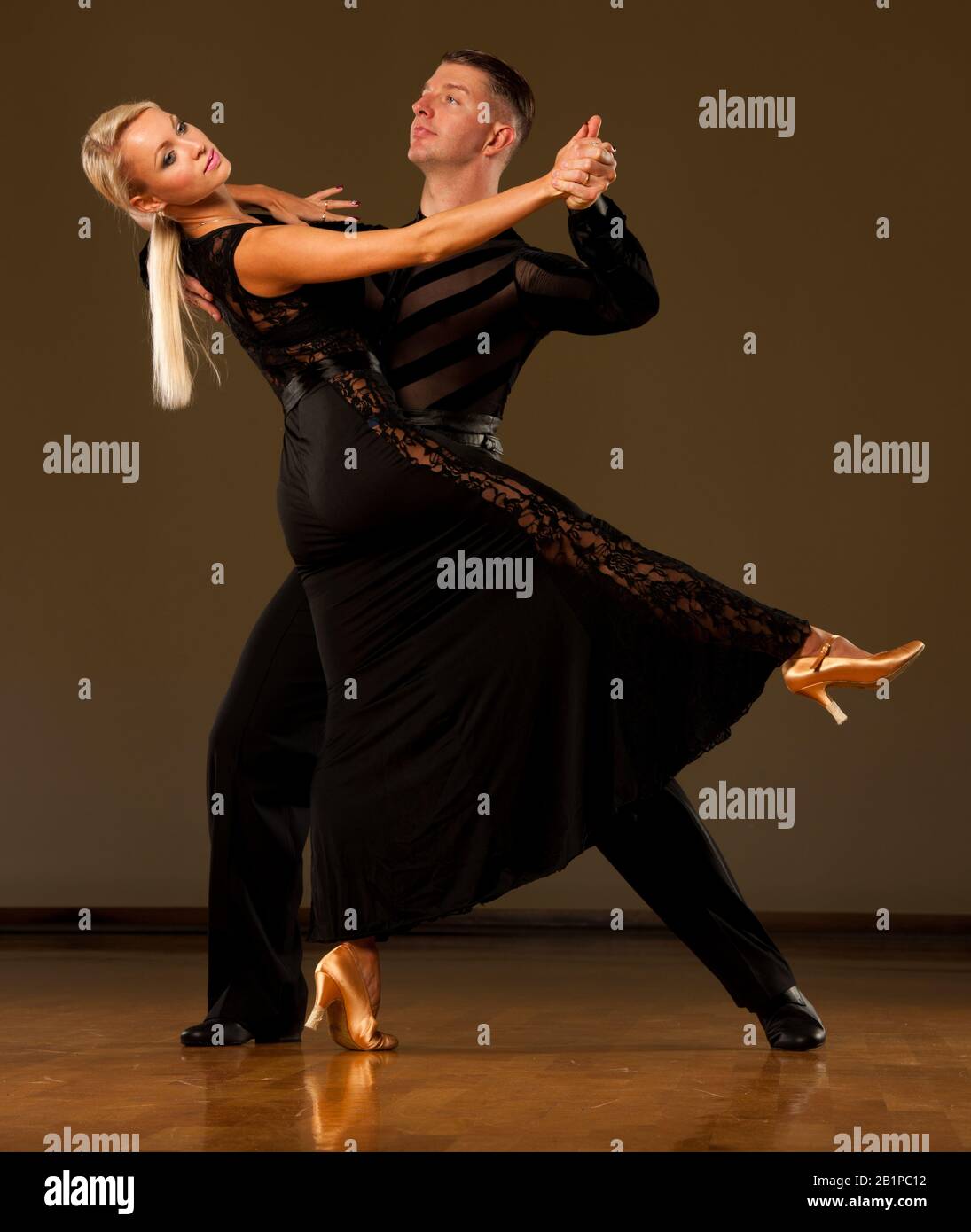 Beautiful ballroom  couple preforms their exhibition dance Stock Photo