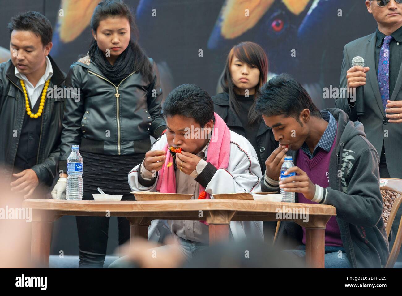 01 Dec 2013, Nagaland, India. Naga Chilli eating competetion, Hornbill festival Stock Photo