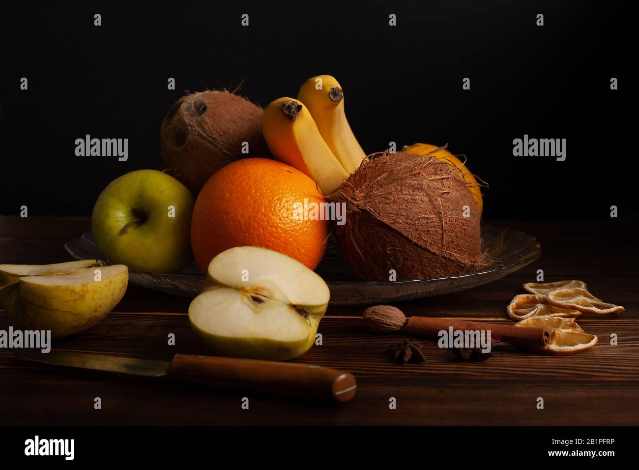 Dramatic still life of assorted fruits zest Stock Photo