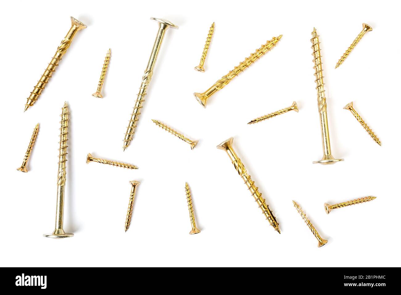 Background from yellow zinc screws. Torx screw on white background Stock Photo