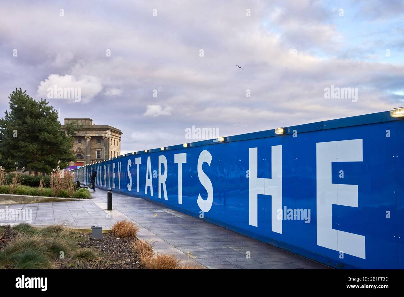 The existing Curzon Street station building in Digbeth area of Birmingham that will form part of the new HS2 railway with site posters Stock Photo