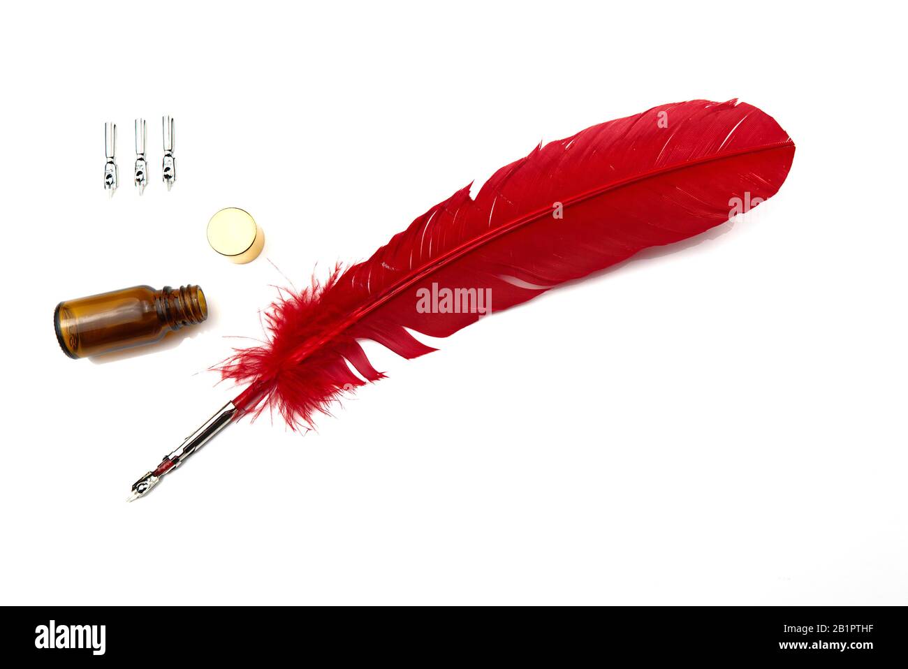 A red feather pen isolated on white background Stock Photo